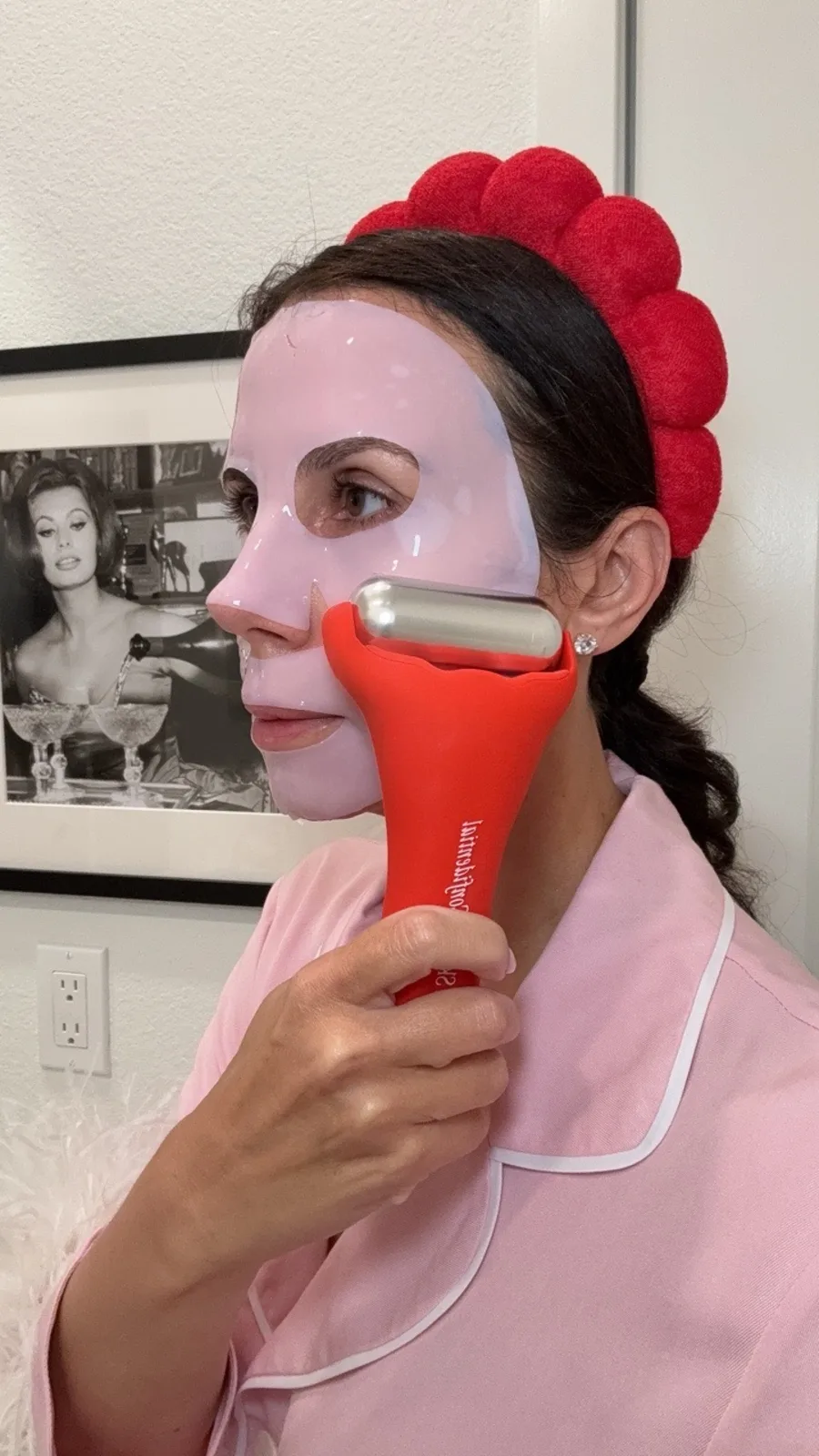 Personal review photo using the Eden Rock red ice roller over a sheet mask